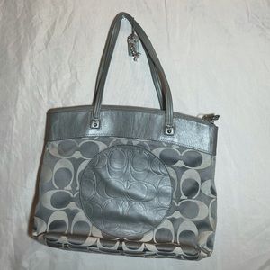 Grey Coach Purse logo